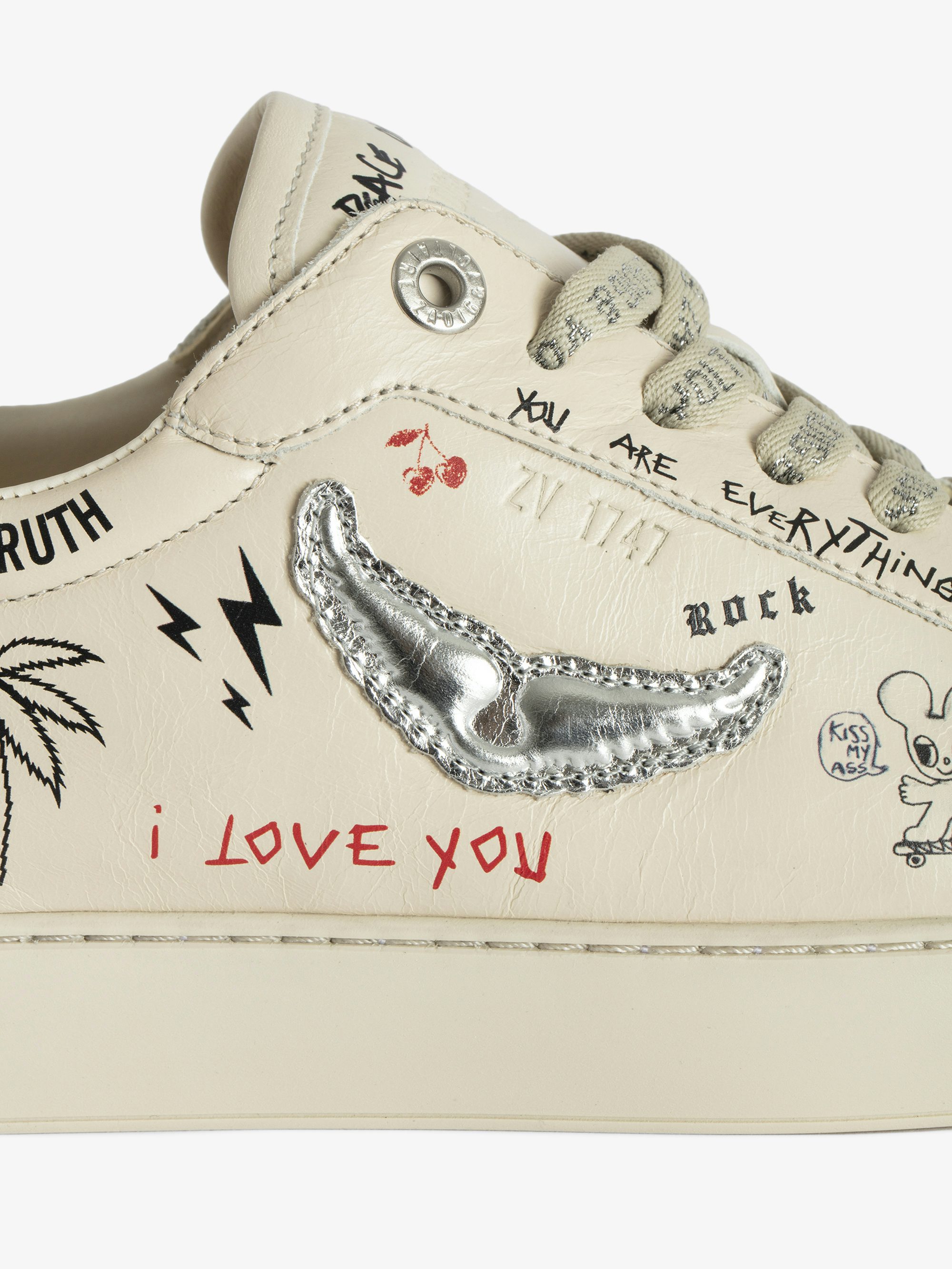 Low-Top Fly On Sneakers - Low-top sneakers with vintage-effect leather print and embossed wings.